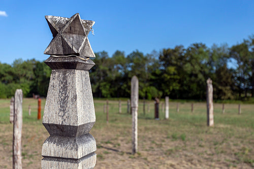 Wooden grave markers in in Karos