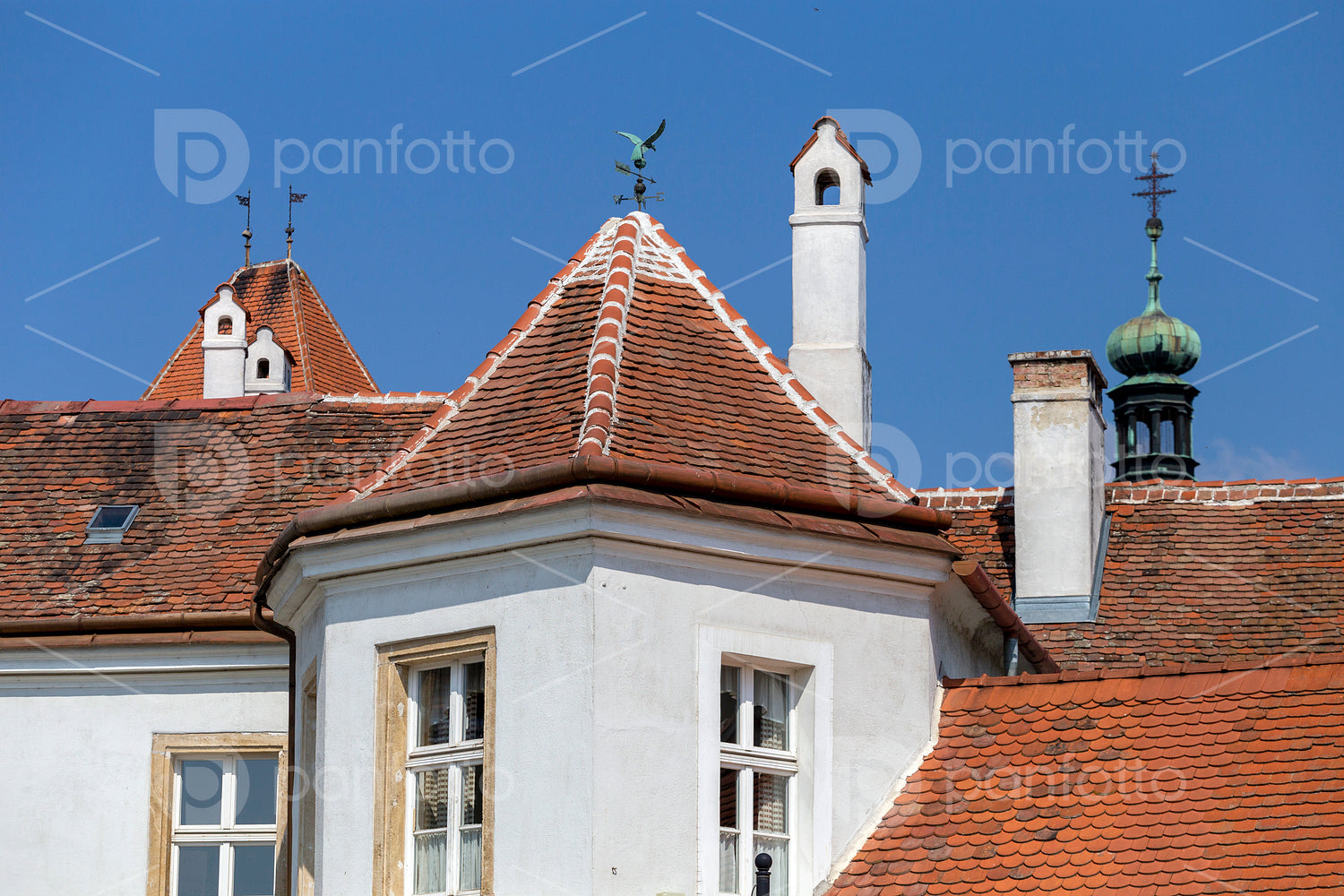 Old buildings and chimneys on the main square of Koszeg, Hungary