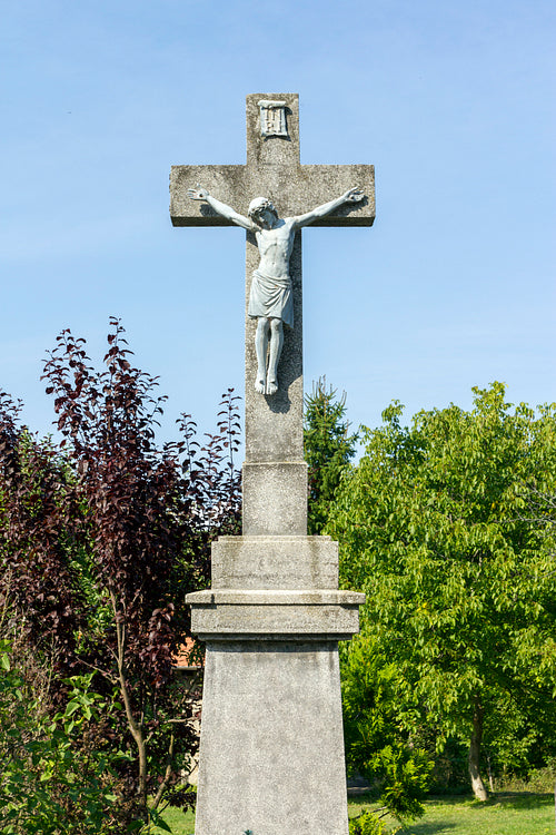 Stone cross in Hollókő