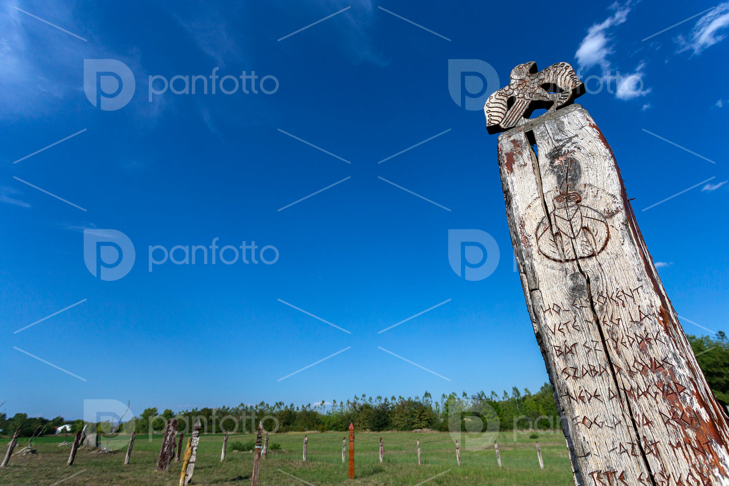 Wooden grave markers in in Karos
