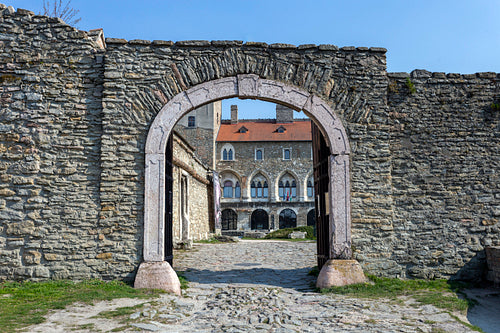The gate of the Tata castle on a sunny spring day.