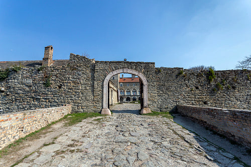 The gate of the Tata castle on a sunny spring day.