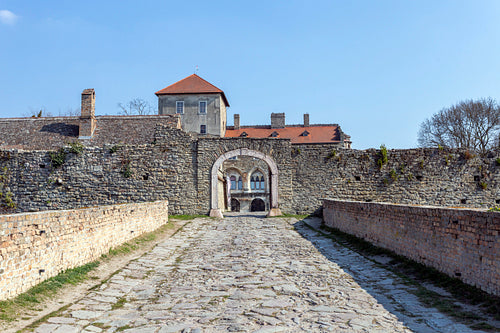 The gate of the Tata castle on a sunny spring day.