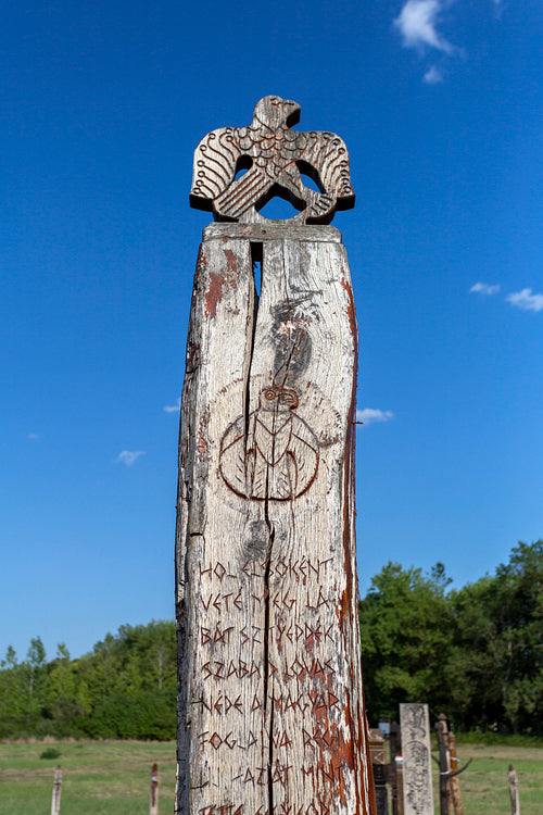 Wooden grave marker in in Karos