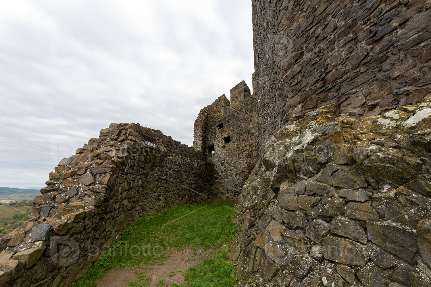Hollókő castle on a cloudy autumn day