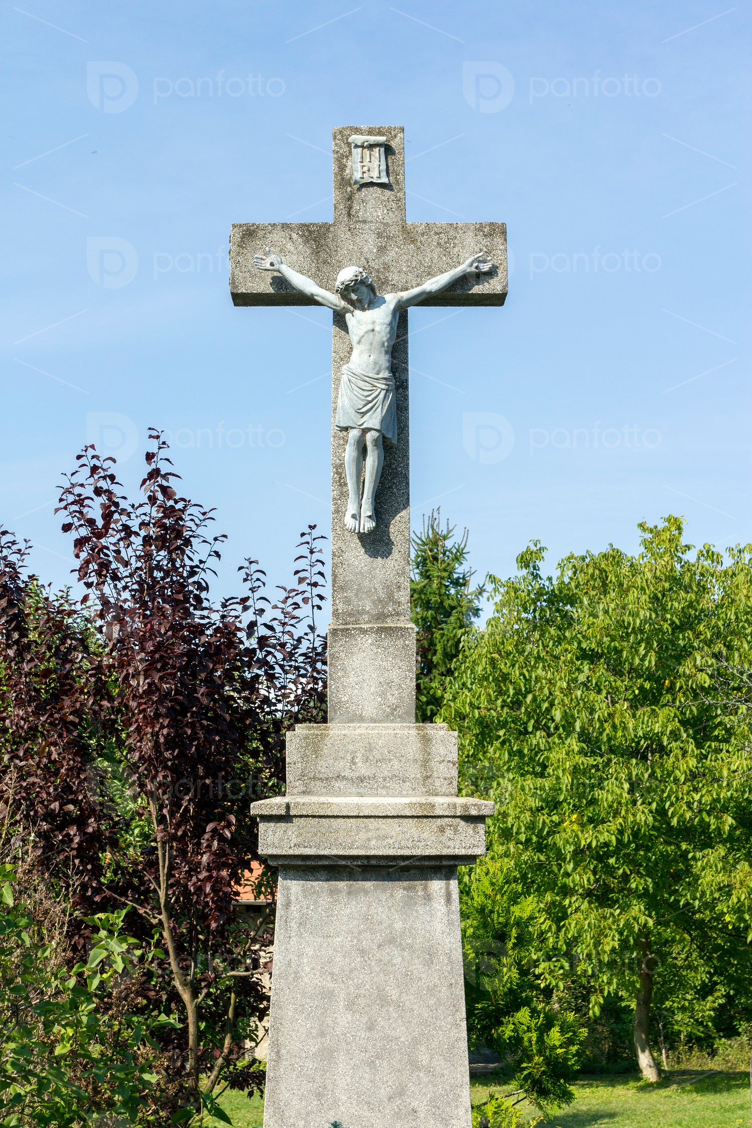 Stone cross in Hollókő