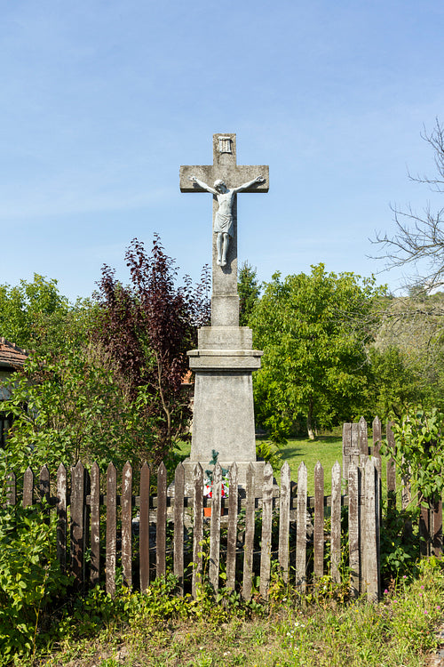 Stone cross in Hollókő