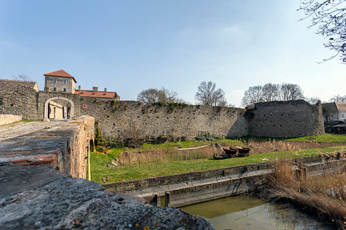The gate of the Tata castle on a sunny spring day.