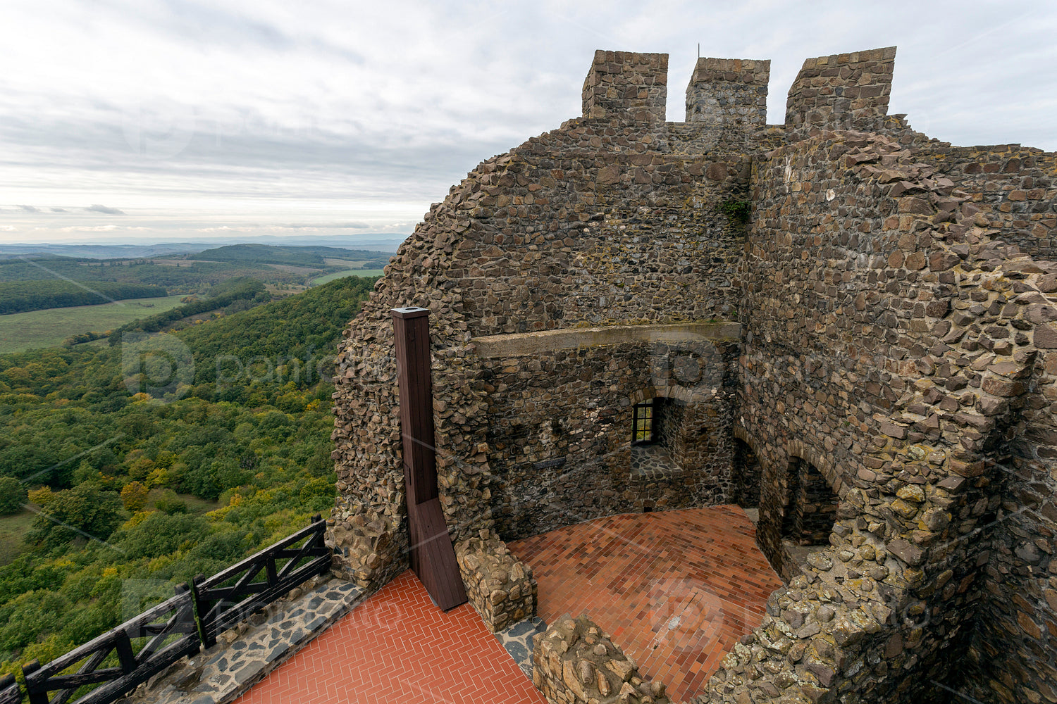 Hollókő castle on a cloudy autumn day
