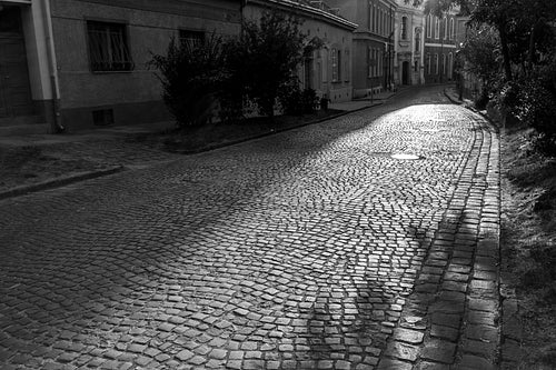 Old buildings on a cobblestone street in Esztergom, Hungary.