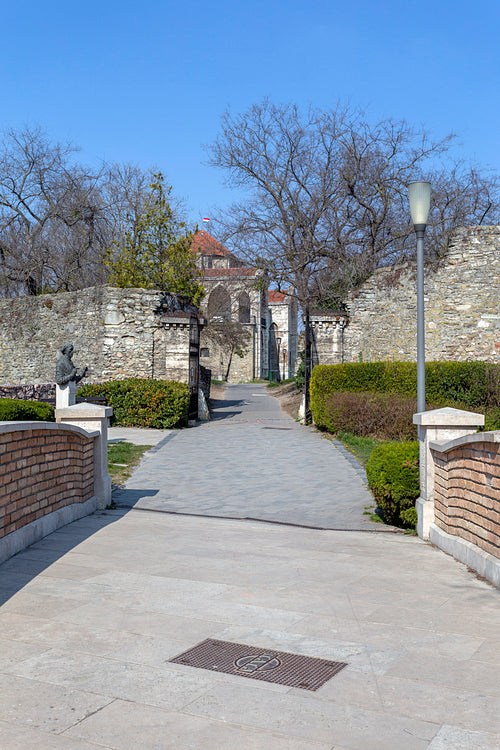 The entrance of the Tata castle on a sunny spring day.