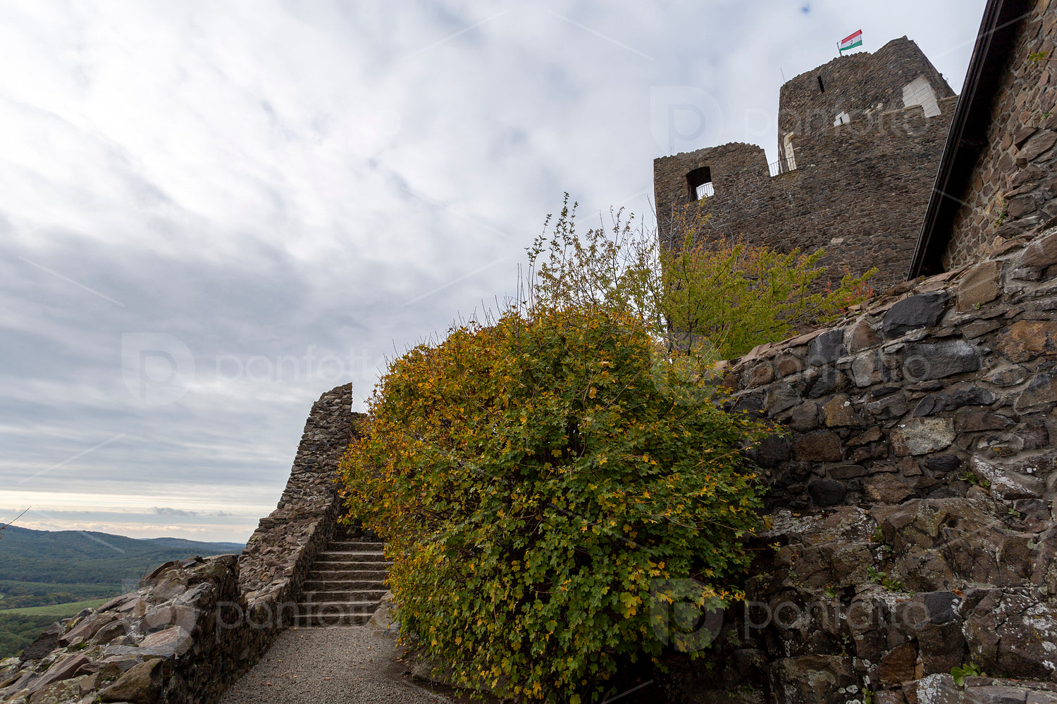 Hollókő castle on a cloudy autumn day