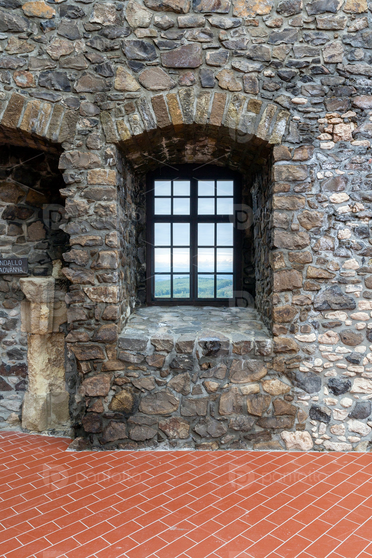 Hollókő castle on a cloudy autumn day