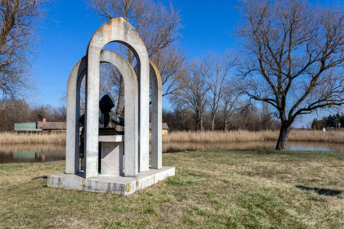Statue of Anonymus at the Ópusztaszer National Heritage Park
