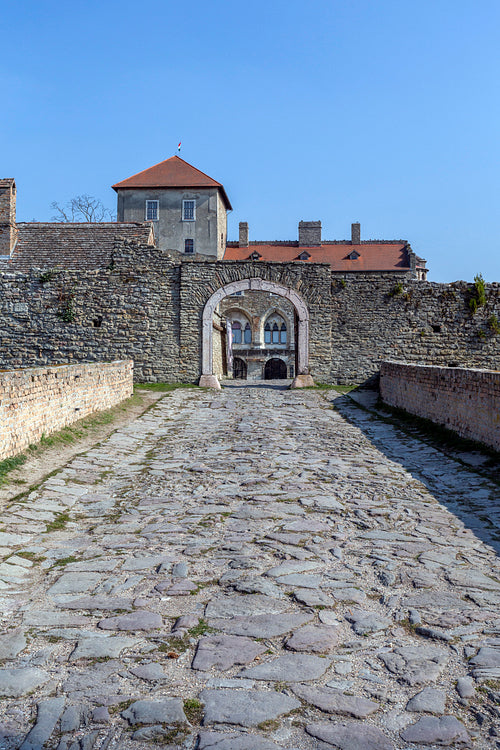 The gate of the Tata castle on a sunny spring day.