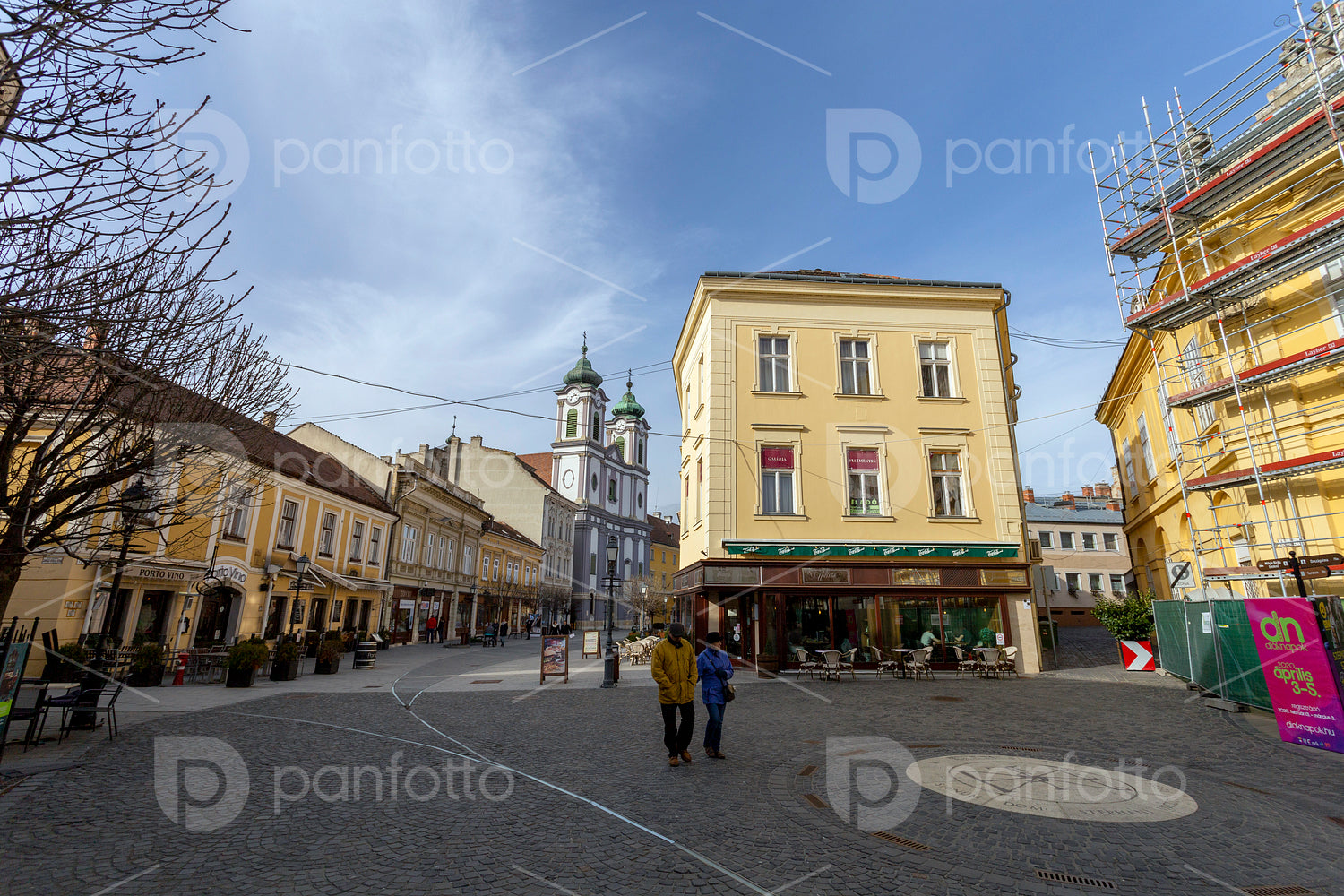 Cobblestone street in Székesfehérvár on a winter day.