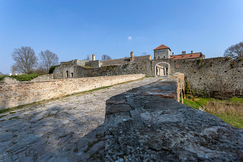 The gate of the Tata castle on a sunny spring day.