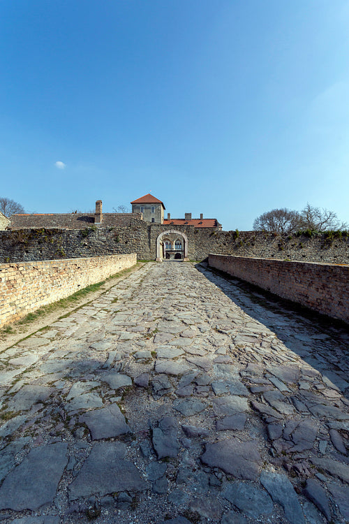 The gate of the Tata castle on a sunny spring day.