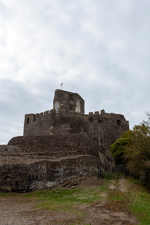 Hollókő castle on a cloudy autumn day